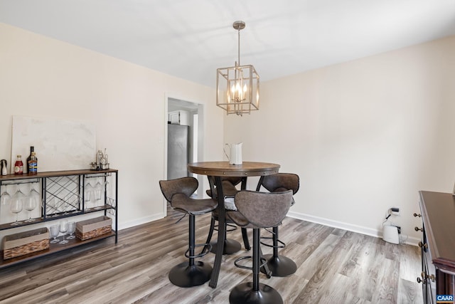 366 Saint Ivy Ave, Troy, VA 22974 - dining space featuring a chandelier and wood finished floors