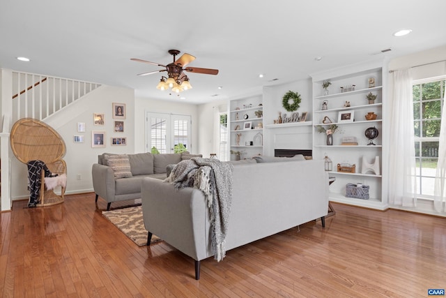 366 Saint Ivy Ave, Troy, VA 22974 - living area featuring stairs, a ceiling fan, light wood-style floors, a fireplace, and recessed lighting