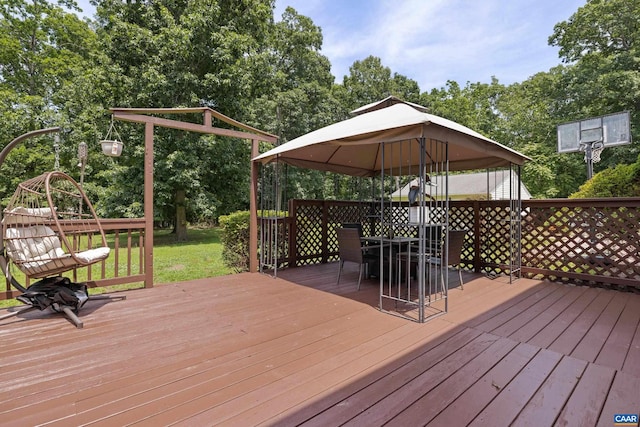 366 Saint Ivy Ave, Troy, VA 22974 - wooden terrace with outdoor dining area, a gazebo, view of scattered trees, and a yard