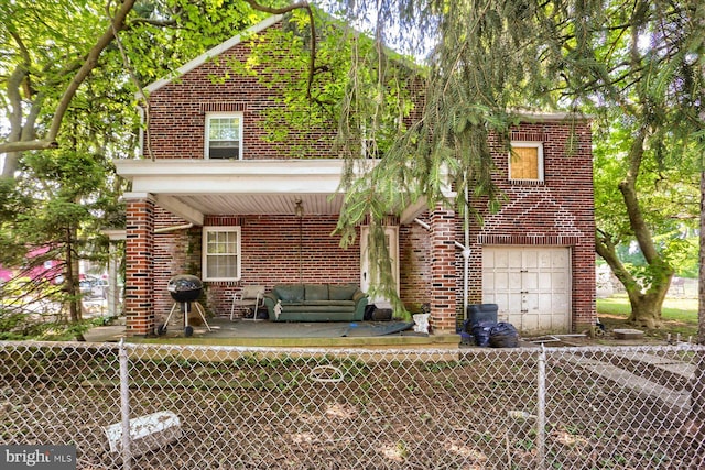 1220 N 14th St, Harrisburg, PA 17103 - view of front of home featuring brick siding and an attached garage