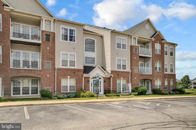 2495 Amber Orchard Ct E Unit 101, Odenton, MD 21113 - view of property featuring uncovered parking