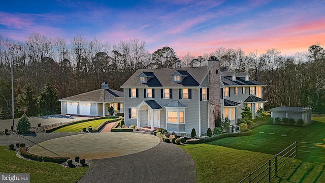 2029 E Buckshutem Rd, Millville, NJ 08332 - view of front of house with an outdoor structure, a chimney, and driveway