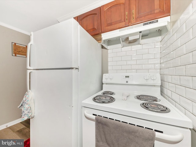 12535 Rockdale Rd, Clear Spring, MD 21722 - kitchen featuring white appliances, tasteful backsplash, brown cabinets, crown molding, and range hood