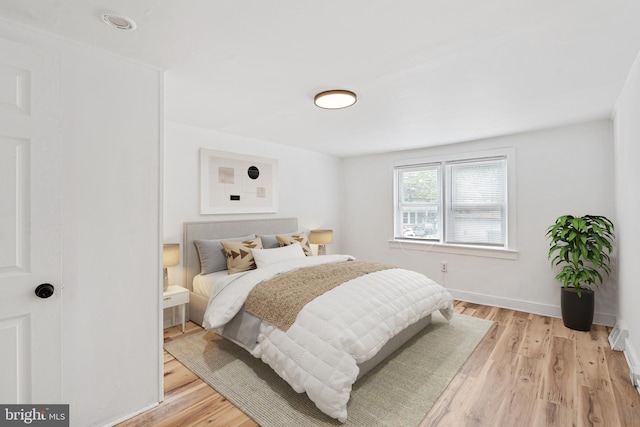 248 S Broadway, Gloucester City, NJ 08030 - bedroom with light wood-type flooring and baseboards