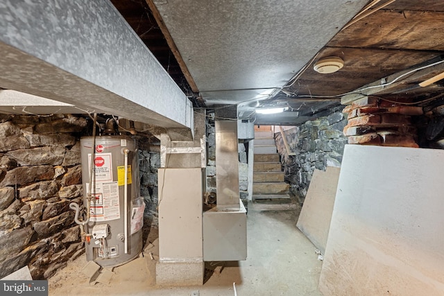 248 S Broadway, Gloucester City, NJ 08030 - unfinished below grade area with water heater, heating unit, and stairs