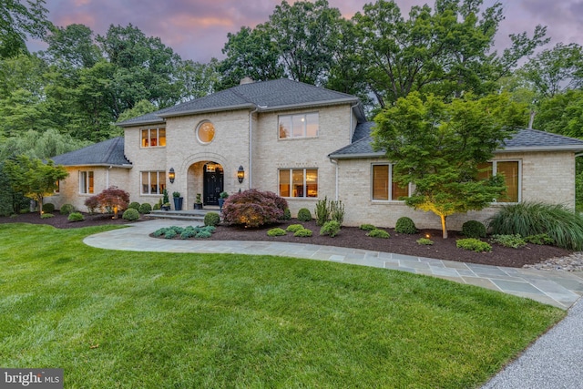 8 Rockland Vue Ct, Towson, MD 21204 - view of front facade with roof with shingles, a lawn, brick siding, and a chimney