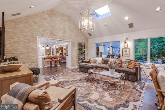 8 Rockland Vue Ct, Towson, MD 21204 - living room featuring high vaulted ceiling, a skylight, a chandelier, wood finished floors, and recessed lighting
