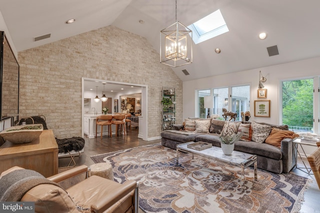 8 Rockland Vue Ct, Towson, MD 21204 - living area featuring a skylight, high vaulted ceiling, wood finished floors, a chandelier, and recessed lighting