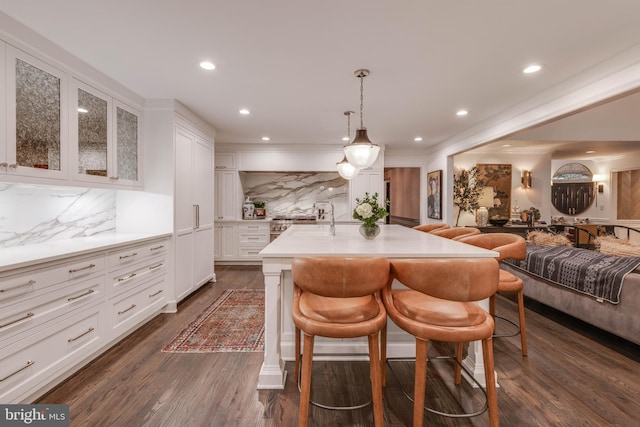 8 Rockland Vue Ct, Towson, MD 21204 - kitchen featuring open floor plan, decorative backsplash, white cabinetry, glass insert cabinets, and light countertops
