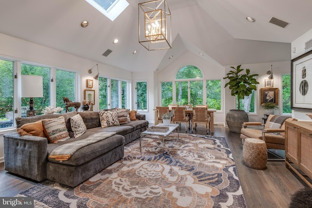 8 Rockland Vue Ct, Towson, MD 21204 - living room featuring wood finished floors, a skylight, high vaulted ceiling, recessed lighting, and a chandelier