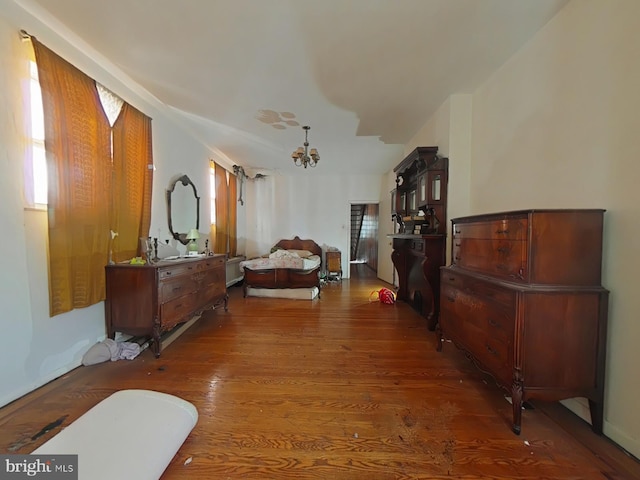 1620 S Broad St, Philadelphia, PA 19145 - bedroom featuring a chandelier, wood finished floors, and multiple windows