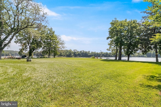 3950 Island Crk, Broomes Island, MD 20615 - view of green lawn featuring a water view