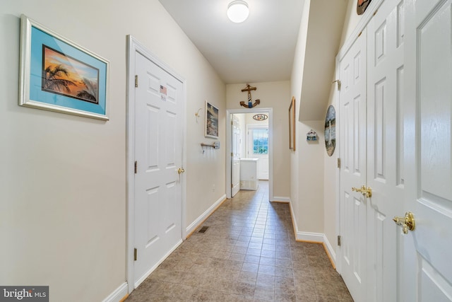 3950 Island Crk, Broomes Island, MD 20615 - hall with baseboards and light tile patterned floors