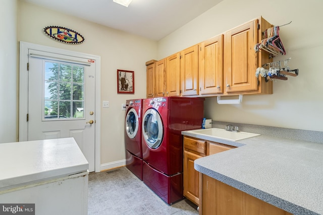 3950 Island Crk, Broomes Island, MD 20615 - laundry room featuring cabinet space and washing machine and clothes dryer