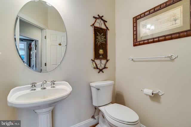 3950 Island Crk, Broomes Island, MD 20615 - half bathroom featuring toilet and baseboards