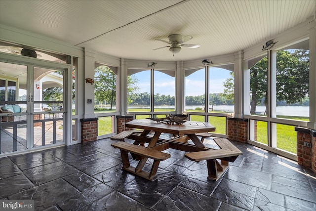 3950 Island Crk, Broomes Island, MD 20615 - sunroom / solarium with stone tile floors, a water view, healthy amount of natural light, and french doors