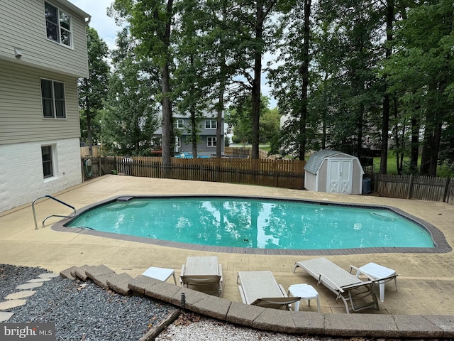 5 Alvin Ct, Stafford, VA 22556 - view of swimming pool with a shed, a patio area, and a fenced backyard