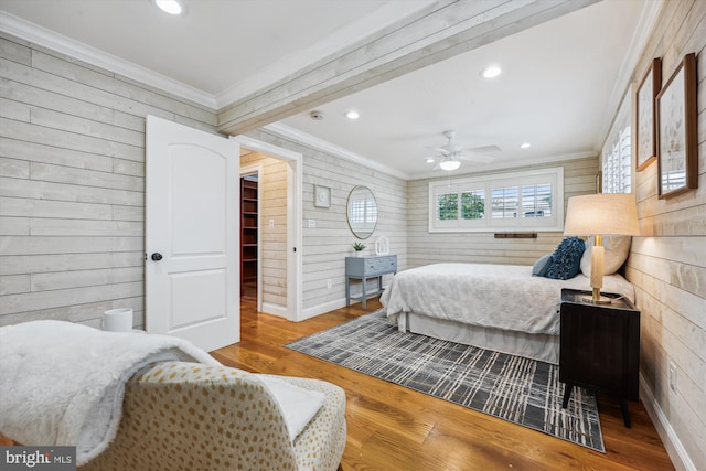 11218 Monticello Ave, Silver Spring, MD 20902 - bedroom with ornamental molding, wood finished floors, wood walls, and recessed lighting
