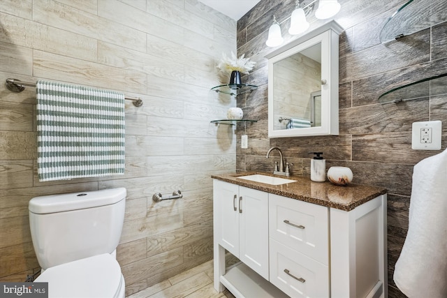 11218 Monticello Ave, Silver Spring, MD 20902 - bathroom with vanity and tile walls