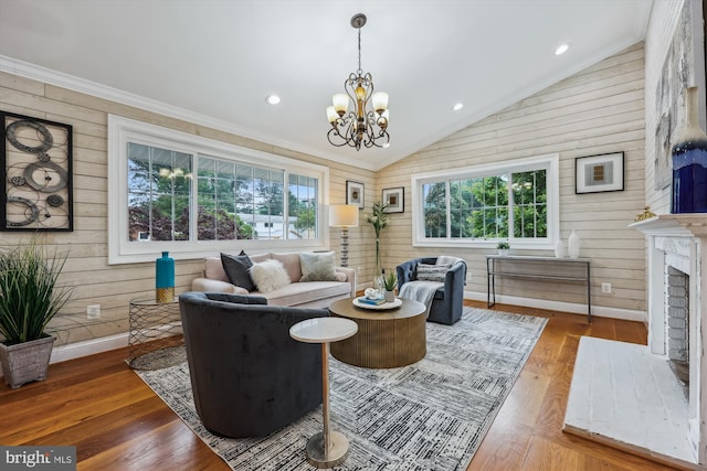 11218 Monticello Ave, Silver Spring, MD 20902 - living area with wooden walls, lofted ceiling, wood finished floors, a chandelier, and a fireplace