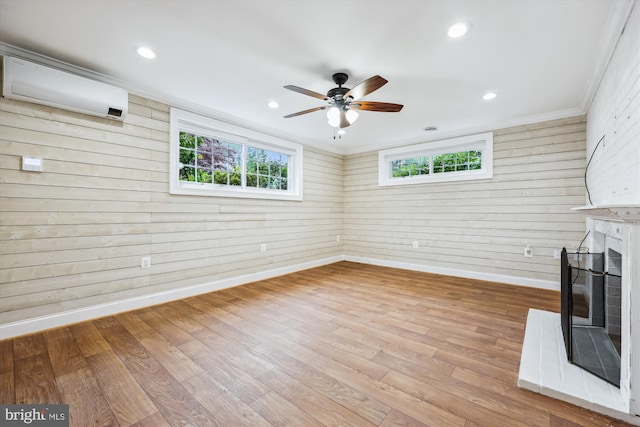 11218 Monticello Ave, Silver Spring, MD 20902 - unfurnished living room with a glass covered fireplace, wood finished floors, a ceiling fan, ornamental molding, and recessed lighting