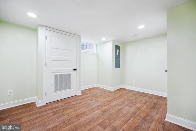 11218 Monticello Ave, Silver Spring, MD 20902 - below grade area with electric panel, light wood finished floors, and recessed lighting
