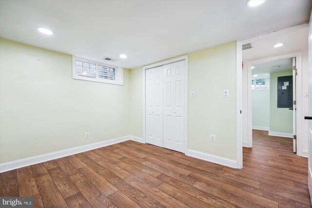 11218 Monticello Ave, Silver Spring, MD 20902 - unfurnished bedroom featuring electric panel, wood finished floors, a closet, and recessed lighting