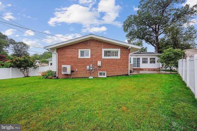 11218 Monticello Ave, Silver Spring, MD 20902 - rear view of property featuring brick siding and a fenced backyard