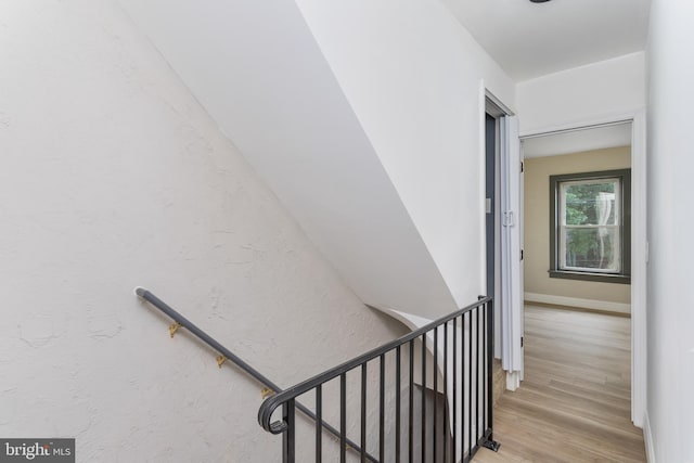 218 Sewell Ave, Hamilton, NJ 08610 - staircase with wood finished floors and a textured wall