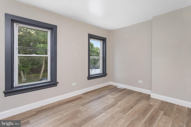 218 Sewell Ave, Hamilton, NJ 08610 - unfurnished room with light wood-style floors and baseboards