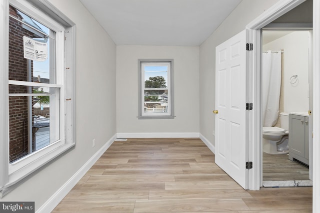 218 Sewell Ave, Hamilton, NJ 08610 - corridor featuring light wood finished floors and baseboards
