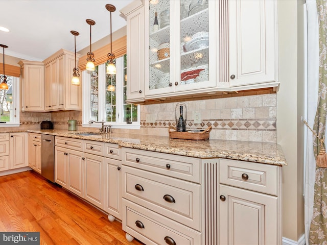 22324 Canterfield Way, Germantown, MD 20876 - kitchen with dishwasher, a sink, backsplash, pendant lighting, and light wood-style flooring