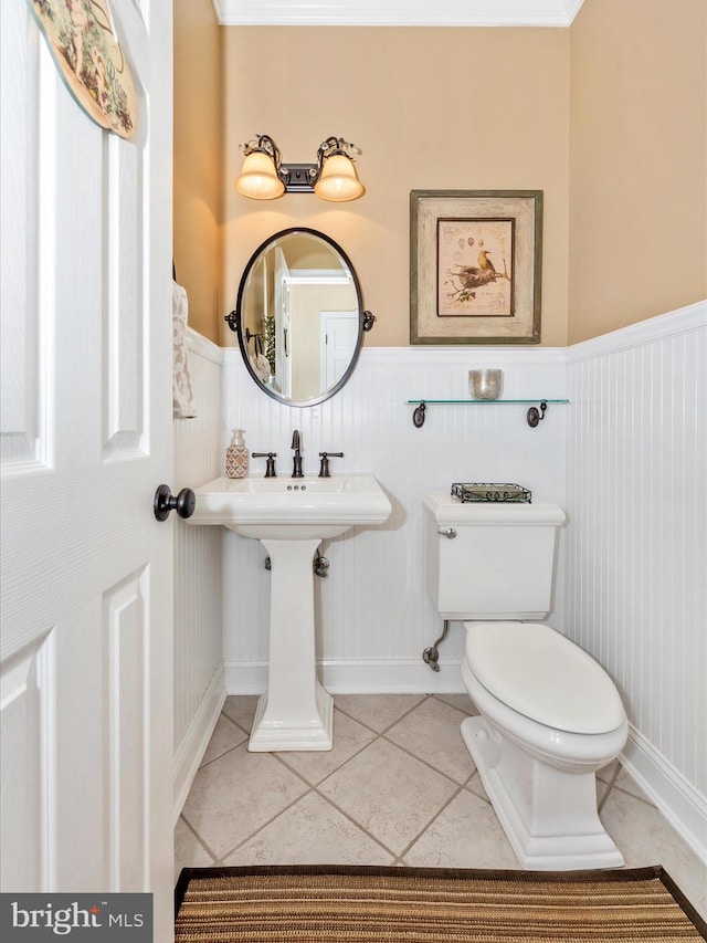 22324 Canterfield Way, Germantown, MD 20876 - half bathroom featuring wainscoting, tile patterned flooring, and toilet