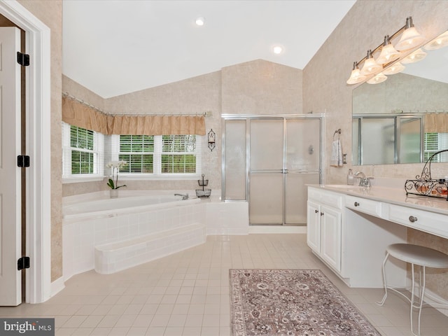 22324 Canterfield Way, Germantown, MD 20876 - bathroom featuring tile patterned flooring, lofted ceiling, vanity, a bath, and a stall shower