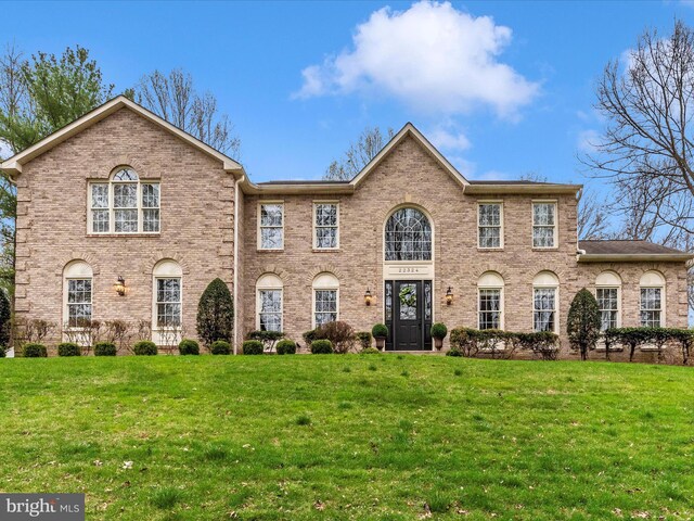 22324 Canterfield Way, Germantown, MD 20876 - colonial home with brick siding and a front lawn