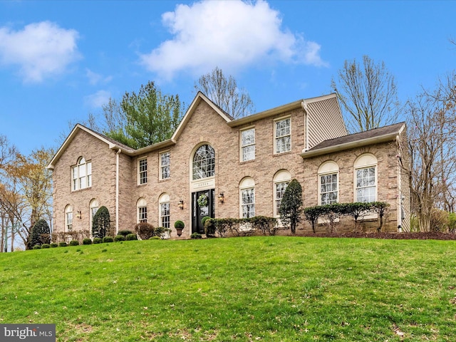 22324 Canterfield Way, Germantown, MD 20876 - georgian-style home with a front yard and brick siding