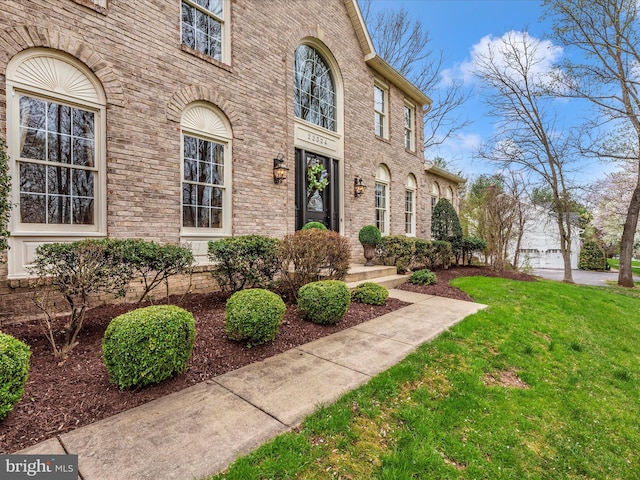 22324 Canterfield Way, Germantown, MD 20876 - entrance to property featuring a yard and brick siding