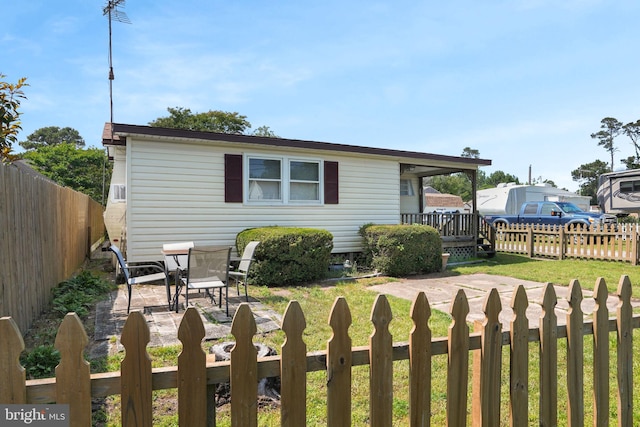 8096 Mire Pond One, Chincoteague Island, VA 23336 - back of property featuring a fenced backyard