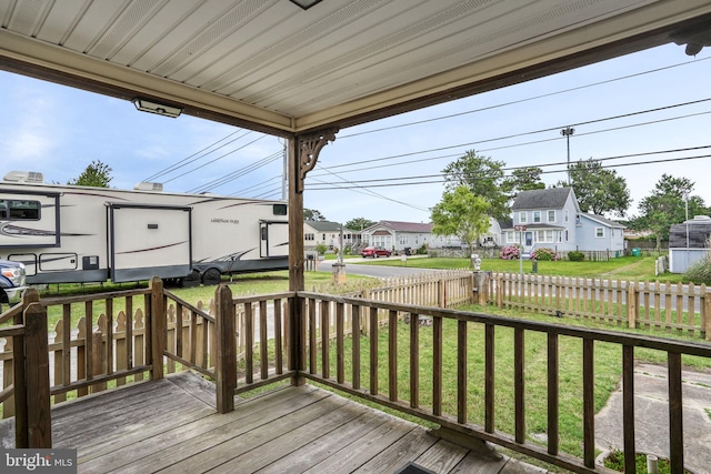 8096 Mire Pond One, Chincoteague Island, VA 23336 - wooden terrace featuring a residential view