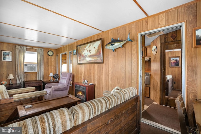 8096 Mire Pond One, Chincoteague Island, VA 23336 - carpeted living area featuring wooden walls and cooling unit