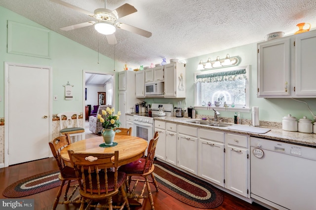 1534 Benton Hollow Rd, Drumore, PA 17518 - kitchen with white appliances, a textured ceiling, lofted ceiling, ceiling fan, and dark wood-style floors