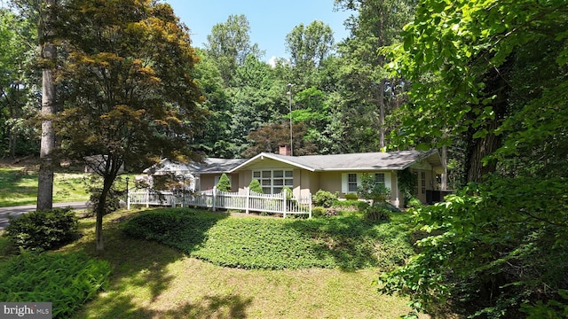 1534 Benton Hollow Rd, Drumore, PA 17518 - view of front facade featuring a chimney and a front lawn