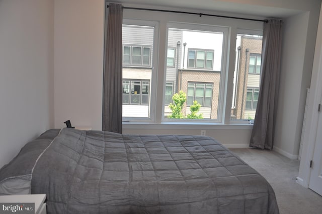 16150 Bowery St, Rockville, MD 20855 - carpeted bedroom featuring baseboards