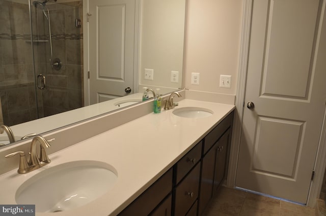 16150 Bowery St, Rockville, MD 20855 - bathroom featuring double vanity, a stall shower, and tile patterned flooring