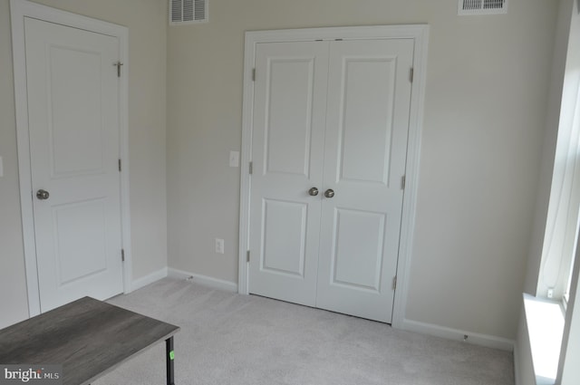 16150 Bowery St, Rockville, MD 20855 - unfurnished bedroom featuring carpet floors, baseboards, and a closet