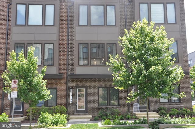 16150 Bowery St, Rockville, MD 20855 - view of front of home with brick siding