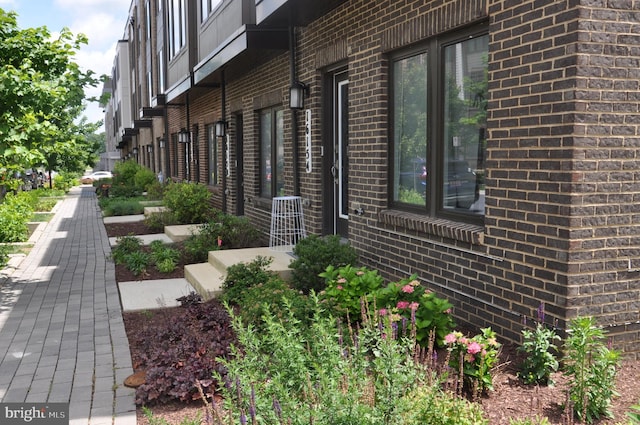 16150 Bowery St, Rockville, MD 20855 - view of property exterior featuring brick siding