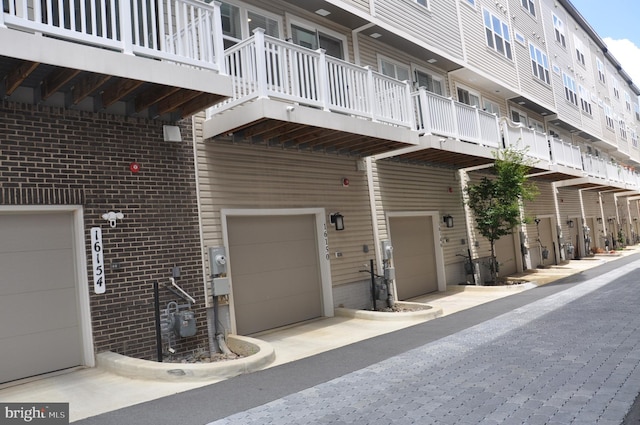 16150 Bowery St, Rockville, MD 20855 - view of property with a garage