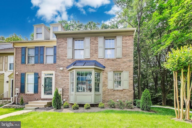 8102 Aspenwood Way, Jessup, MD 20794 - view of property with brick siding and a front lawn