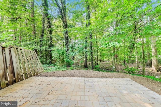 8102 Aspenwood Way, Jessup, MD 20794 - view of patio / terrace with a forest view